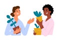 Two young women choose houseplants, holding plants in pots, female friends choose and buy plants, gardening hobby