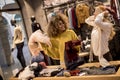 Two young women choosing winter clothes Royalty Free Stock Photo