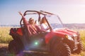 Two young women driving a off road buggy car Royalty Free Stock Photo