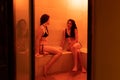 Two young women enjoying hammam or turkish bath Royalty Free Stock Photo