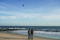 Two young women flying kite at Atlantic beach