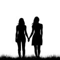 Two young women holding hands walkingon the grass