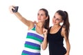 Two young women making selfie