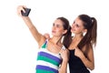 Two young women making selfie