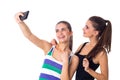 Two young women making selfie