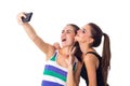 Two young women making selfie