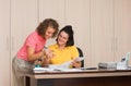 Two young women in office Royalty Free Stock Photo