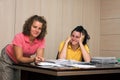 Two young women in office Royalty Free Stock Photo