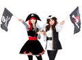Two young women in pirate costumes isolated