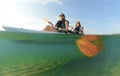 Two young women smiling in kayak