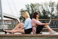 Two young women with a tablet computers