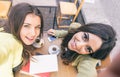 Two young women taking selfie with smart phone Royalty Free Stock Photo