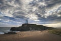 Stunning Twr Mawr lighthouse landscape from beach with dramatic