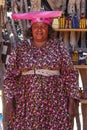 Twyfelfontein, Namibia - Jul 10, 2019: Herero Woman in traditional clothes in Twyfelfontein. Namibia