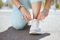 Tying shoes, running training and woman start workout, exercise and sports fitness in urban city outdoors. Closeup Royalty Free Stock Photo