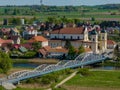 Tykocin, Poland - aerial drone view photography of church and bridge over Narew river Royalty Free Stock Photo