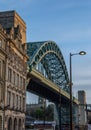 The Tyne Bridge during the Blue hour, surrounded by the beautiful architecture of Newcastle, England Royalty Free Stock Photo