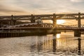The Tyne Bridge at sunset, reflecting in the almost still River Tyne beneath Royalty Free Stock Photo