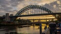 Tyne Bridge in Newcastle Upon Tyne, UK, lit up by the stunning golden light of the setting sun