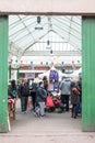 Entrance to Tynemouth Metro Station weekend flea market with customers visible