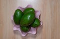 Avocados fruit on the wood table with pink wall background part 4