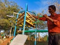 type of gears science project model displayed by Asian man in India January 2020 Royalty Free Stock Photo