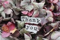 A thank you note and flowers