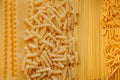 Types of pasta on full frame. shapes of handmade pasta. real life atmosphere. from durum wheat homemade pasta . Mediterranean