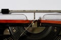 Typewriter with a blank white paper. Writing on typewriter. Royalty Free Stock Photo