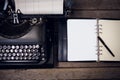 Typewriter by fountain pen on open diary Royalty Free Stock Photo