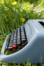 Typewriter on the grass