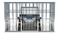 Typewriter inside cage, prison cell. 3D rendering Royalty Free Stock Photo