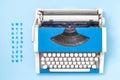 Typewriter with letters minimalistic creative concept. Royalty Free Stock Photo