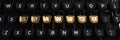 Typewriter with SPANISH gold buttons Royalty Free Stock Photo