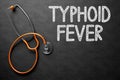 Typhoid Fever Handwritten on Chalkboard. 3D Illustration. Royalty Free Stock Photo