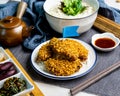 Typhoon Shelter Chicken Wing with fish noodle soup and fish udon served on bowl isolated on napkin side view of fastfood Royalty Free Stock Photo