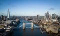 Typical aerial view over the city of London with Tower Bridge and River Thames - LONDON, UK - DECEMBER 20, 2022 Royalty Free Stock Photo