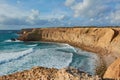 Typical Algarvian landscape with limestone rocks washed by the waves. Bordeira, Portugal