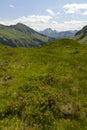 Typical alpine landscape in early summer near Damuls, Vorarlberg, Austria Royalty Free Stock Photo