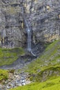 Typical alpine landscape with waterfalls, Swiss Alps near Klausenstrasse, Spiringen, Canton of Uri, Switzerland