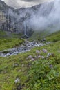 Typical alpine landscape with waterfalls, Swiss Alps near Klausenstrasse, Spiringen, Canton of Uri, Switzerland