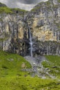 Typical alpine landscape with waterfalls, Swiss Alps near Klausenstrasse, Spiringen, Canton of Uri, Switzerland