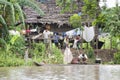 Typical Amazon home with inhabitants of Amazonia living on shoreline. Laundry drying in the fresh air