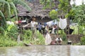 Typical Amazon home with inhabitants of Amazonia living on shoreline. Laundry drying in the fresh air Royalty Free Stock Photo