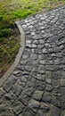 Typical ancient Roman porphyry brick floor near a green lawn