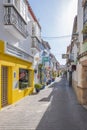 Typical Andalusian street adorned with pots and flowers in Estepona, Costa del Sol, Spain Royalty Free Stock Photo