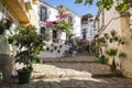 Typical Andalusian street adorned with pots and flowers in Estepona, Costa del Sol, Spain Royalty Free Stock Photo