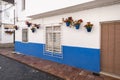 Typical Andalusian street adorned with pots and flowers in Estepona, Costa del Sol, Spain Royalty Free Stock Photo