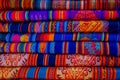 The typical andean fabrics sold on the handicrafts market of Otavalo, Ecuador Royalty Free Stock Photo