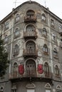 Typical Antique Portuguese Architecture: Grey Facade with Old Wi